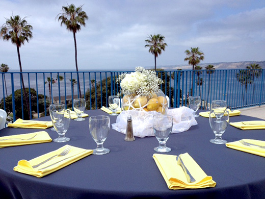 Table setting for a wedding reception at La Jolla Cove Suites.