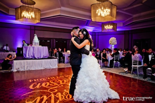 Newley wed couple with their first dance at their San Diego wedding reception.