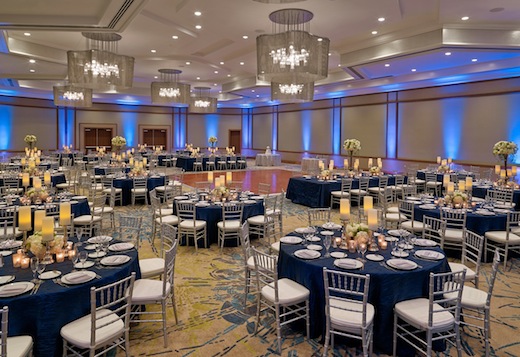 The Westin San Diego table settings with blue and gold themes.