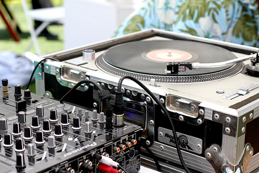 Close Up of DJ Mixer and Turntable