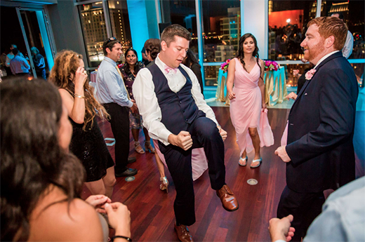 Groom Dancing At Wedding